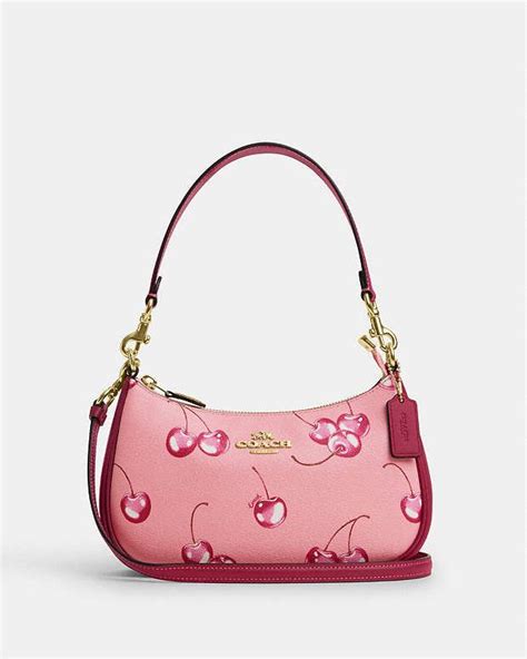 teri shoulder bag with cherry print|cherry print coach purse.